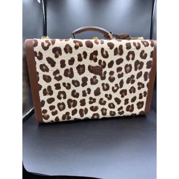 HA HA HA RIGID SUITCASE IN NEUTRAL
Gucci HA HA HA - Picture 1 of 11